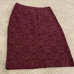 Maroon lace floral skirt.